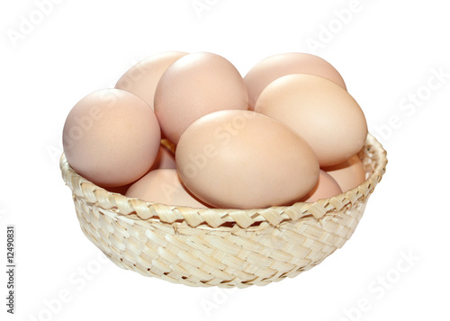 Isolated basket with eggs inside