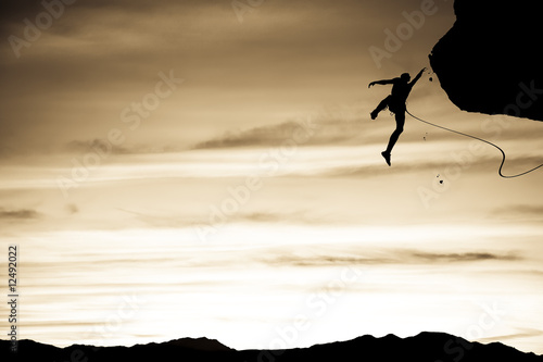 Fényképezés Rock climber falling.