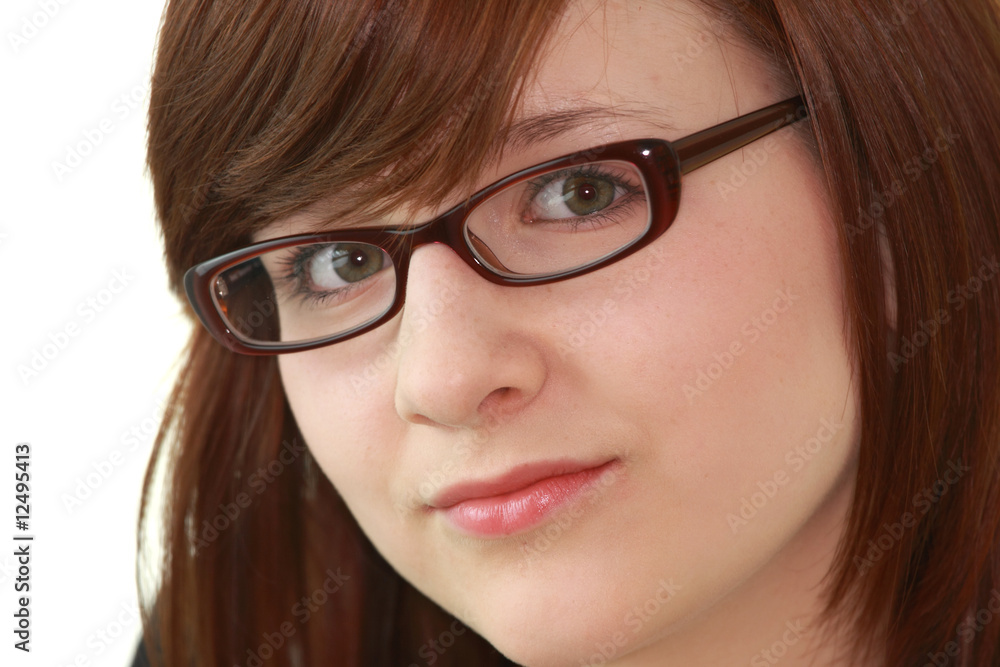 Portrait of young female teenager in glasses