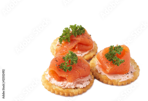 Smoked salmon and cream cheese on crackers