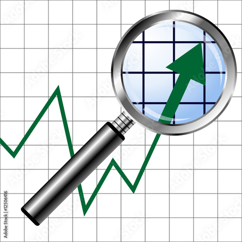 Magnifying glass over uprising graphic chart background