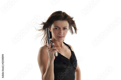 young woman with revolver isolated on white background