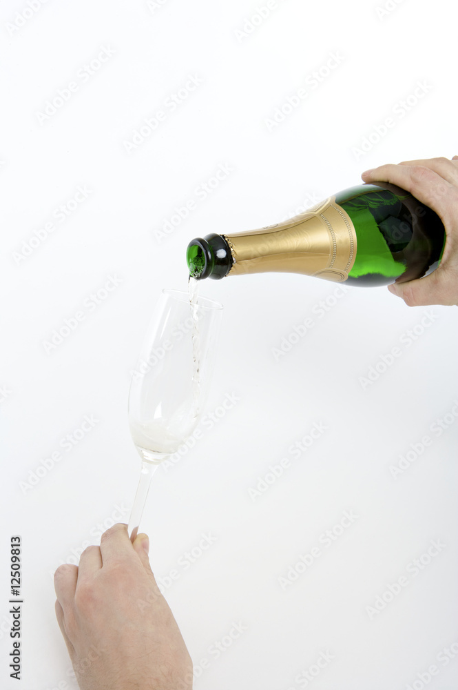 Fototapeta premium filling a glass with champagne