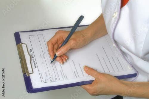 Therapist taking patient's medical history photo