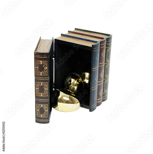 Принти на полотні Golden eggs pouring from wooden book