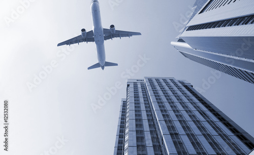 airplane and the modern building
