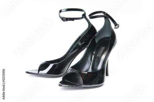 Pair of black female glossy shoes