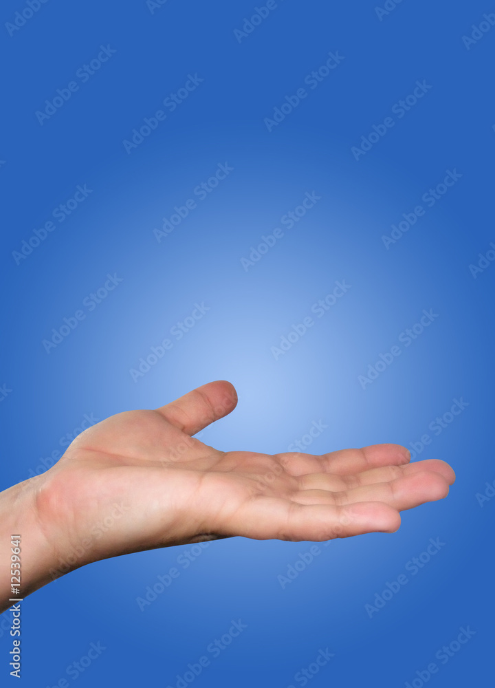 Hand in Air Against a Blue Background. Hand in Air Against a Blue Background.