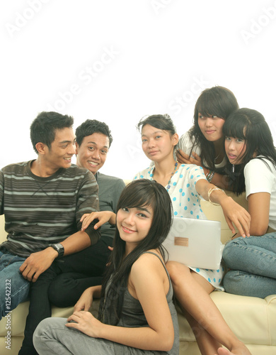 group of young people on sofa