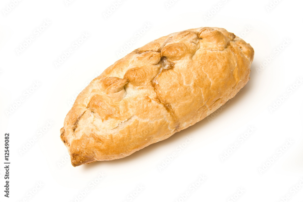 Cornish pasty isolated on a white studio background. Cornish pasty isolated on a white studio background.