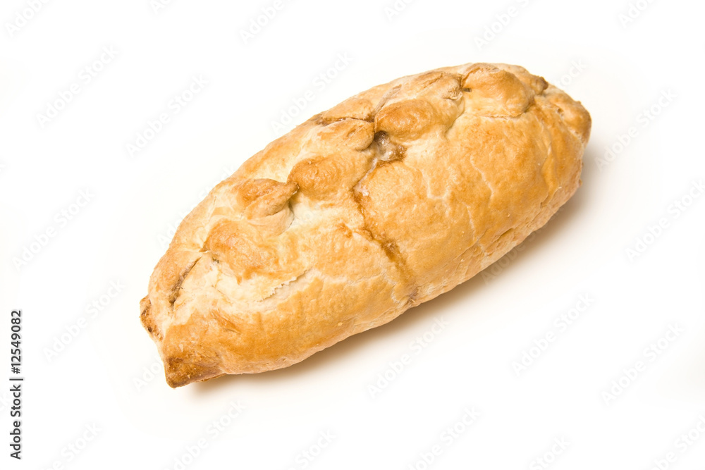 Cornish pasty isolated on a white studio background.