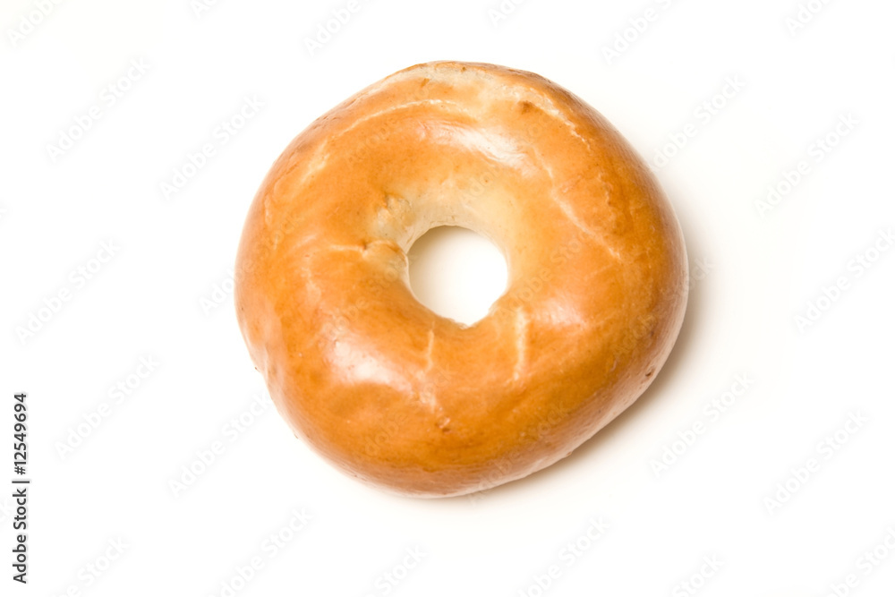 Bagel isolated on a white studio background. Bagel isolated on a white studio background.