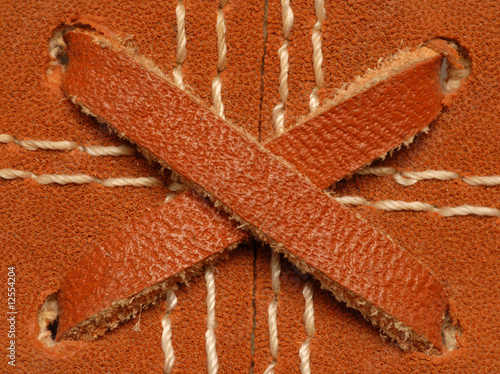 Photography close of details on a leather baseball glove or mitt