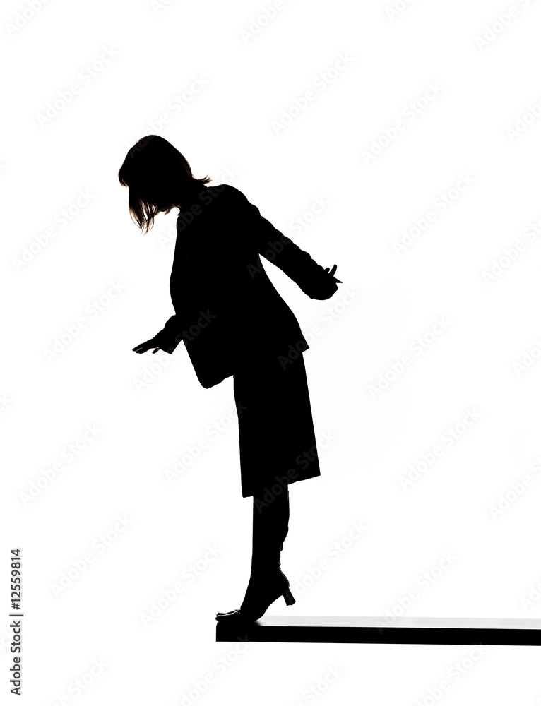 Silhouette of a woman on the edge