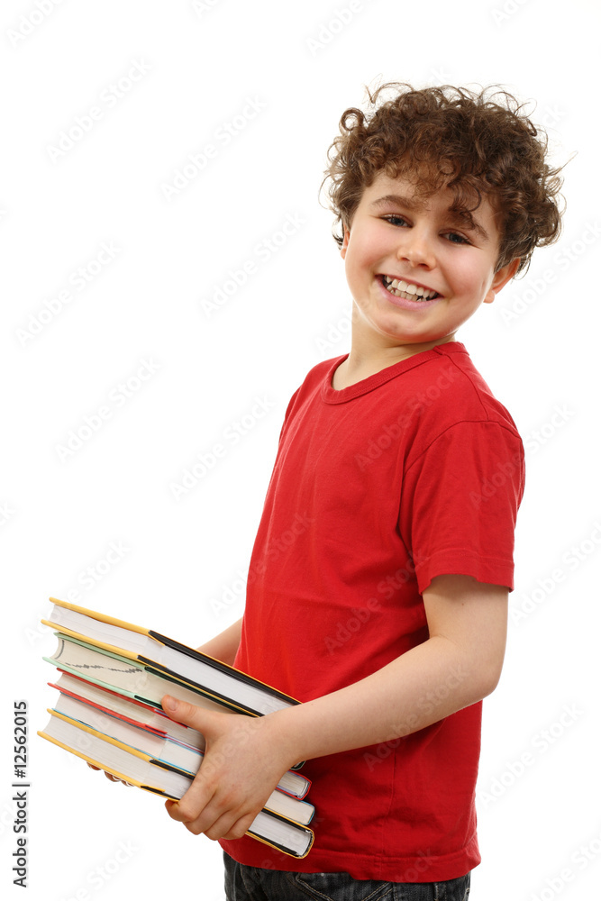 Fototapeta premium Successful boy holding books isolated on white background