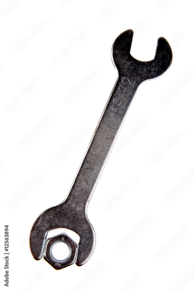 Wrench and nut on white Wrench and nut on white