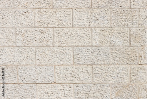 Vertical wall built of Jerusalem stone blocks