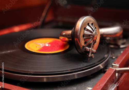 Old vintage gramophone playing vinyl record