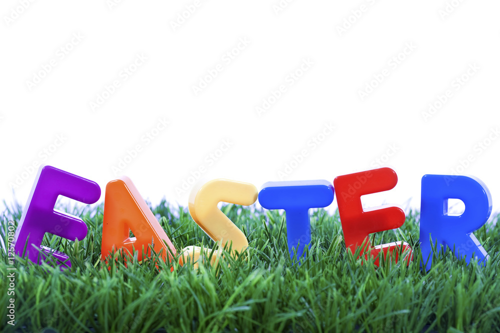 Easter word made with plastic letters on green grass Easter word made with plastic letters on green grass