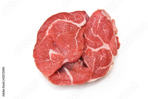 Stewing steak  isolated on a white studio background. photo