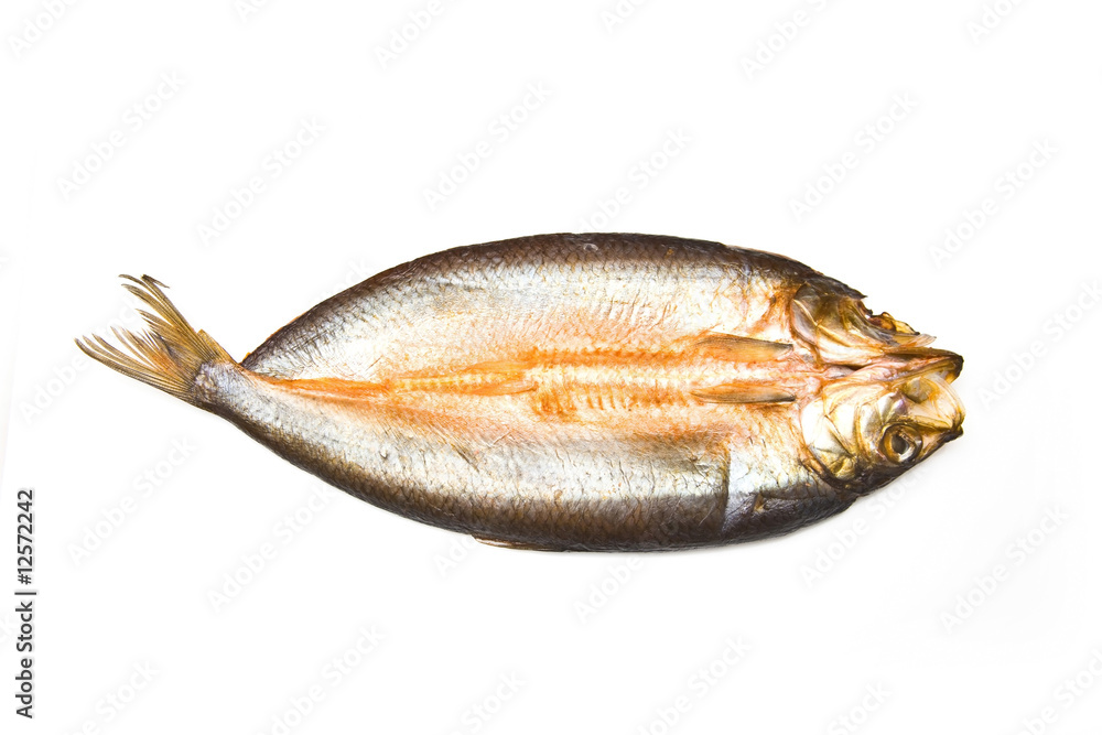 Traditional smoked kipper isolated on a white studio background. Traditional smoked kipper isolated on a white studio background.
