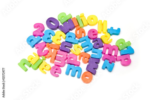 Magnetic letters isolated on a white studio background. photo