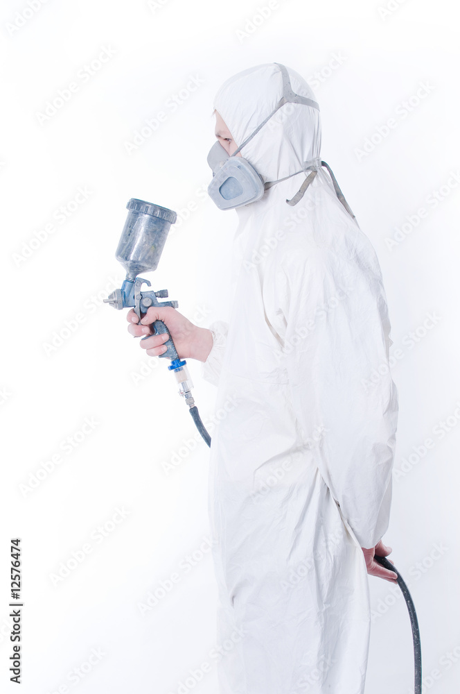 Worker with airbrush gun