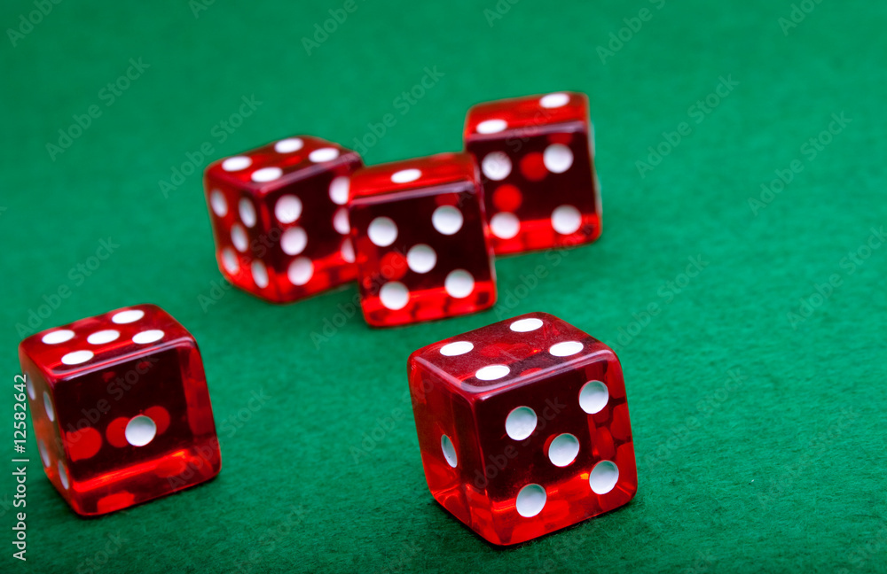 red dice on green red dice on green