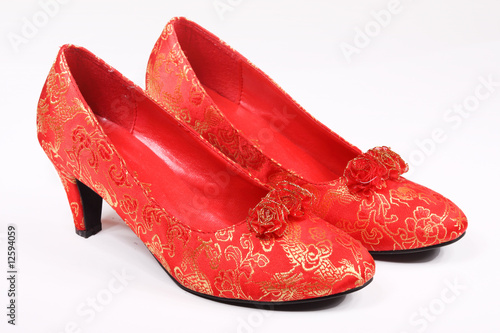 Red high-heeled shoes with Chinese designs