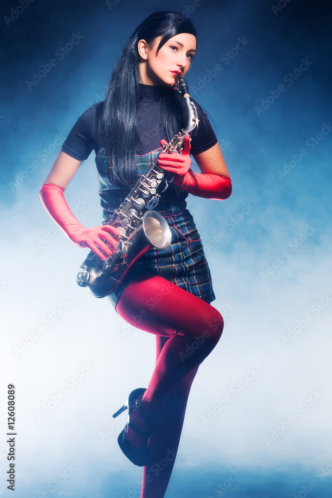 Young woman with saxophone