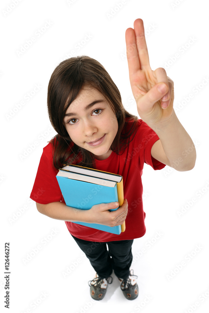 Young girl holding books, looking up isolated on white Young girl holding books, looking up isolated on white