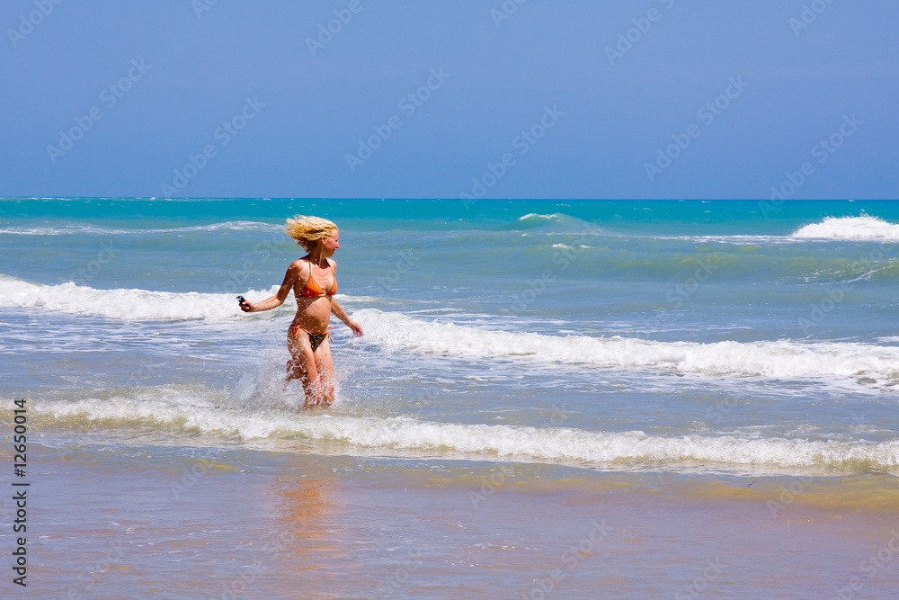 a beutiful woman on the beach in Mediterranean a beutiful woman on the beach in Mediterranean