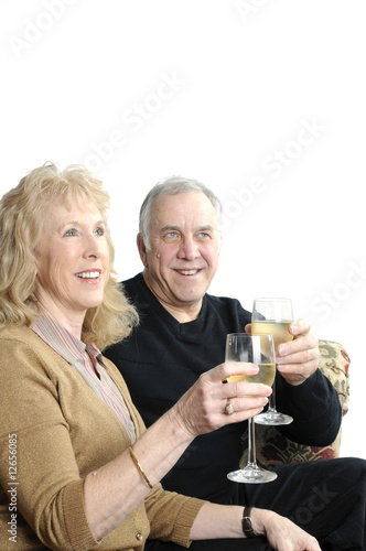 Older couple going over the damage the stock market crash has ha