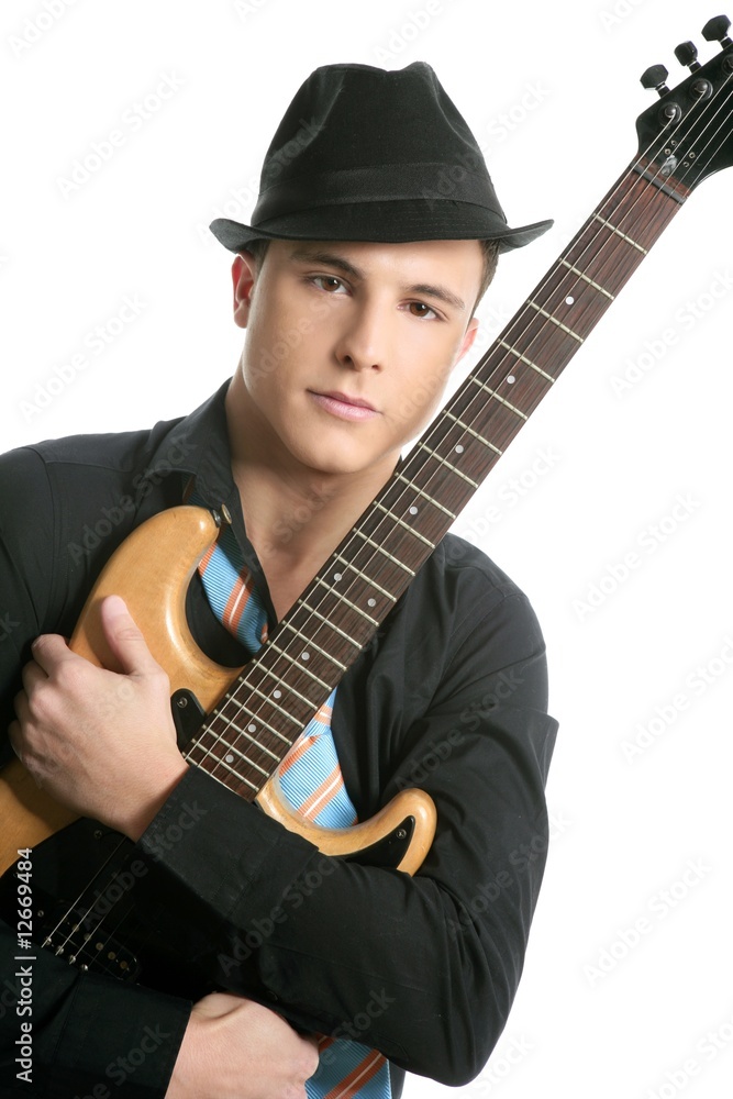 Obraz premium young sexy male guitar player, tie and black hat