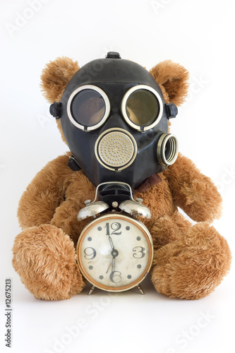 The Nursery toy, gas mask, old watch on white background.