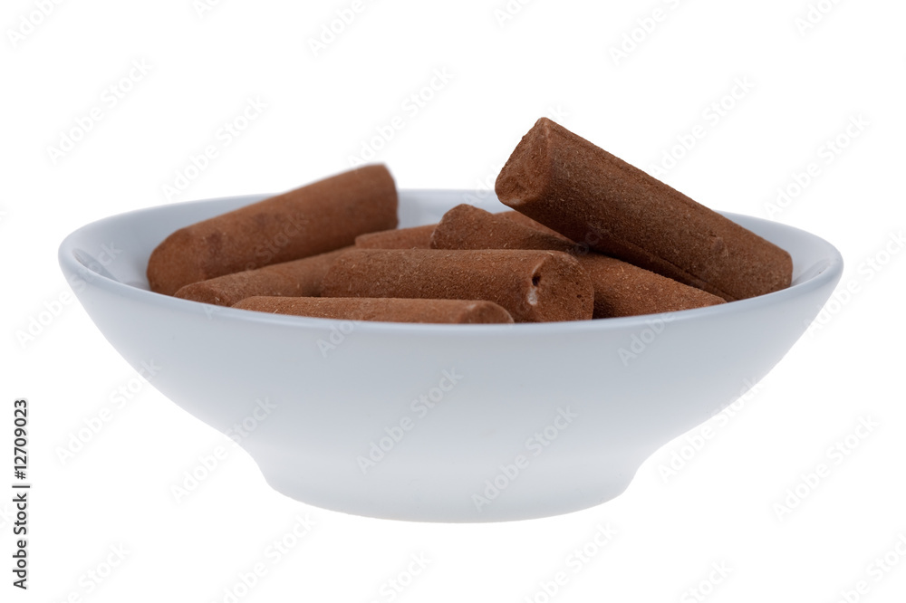 Cinnamon candy sticks in a bowl Cinnamon candy sticks in a bowl