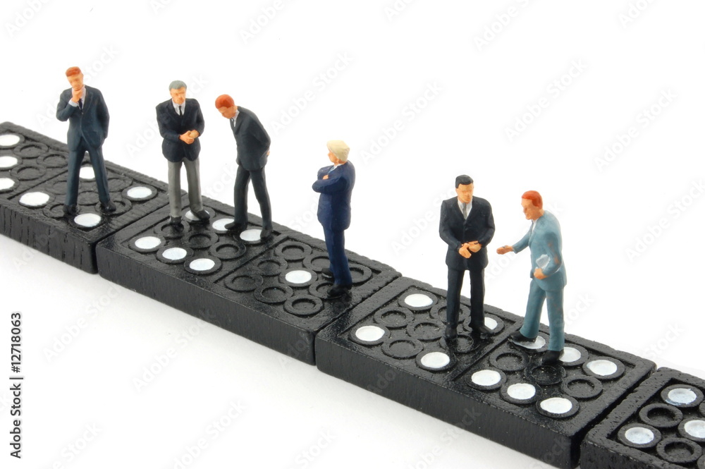 business man on domino business man on domino