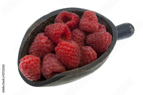 scoop of fresh red raspberries