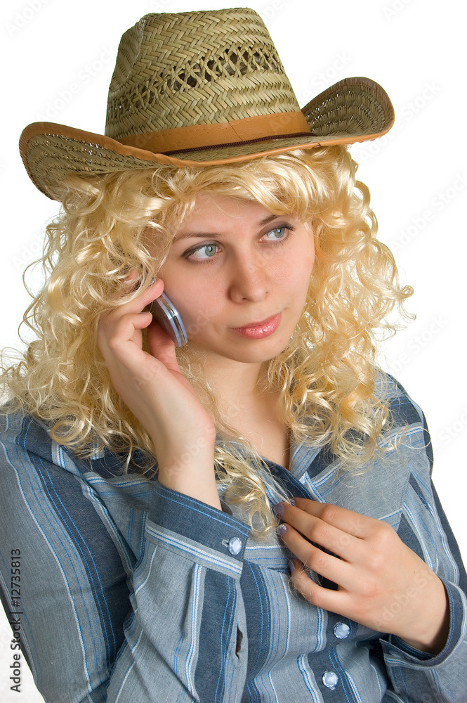 blonde girl in straw hat with cellular phone