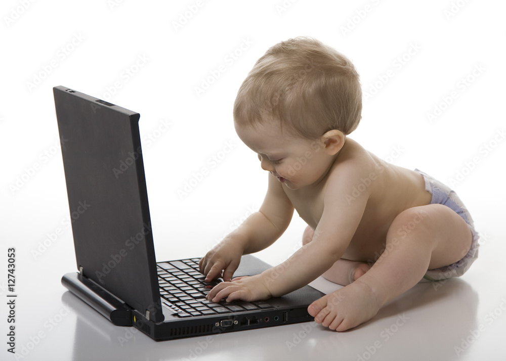 Baby Boy Playing on Laptop Computer Baby Boy Playing on Laptop Computer