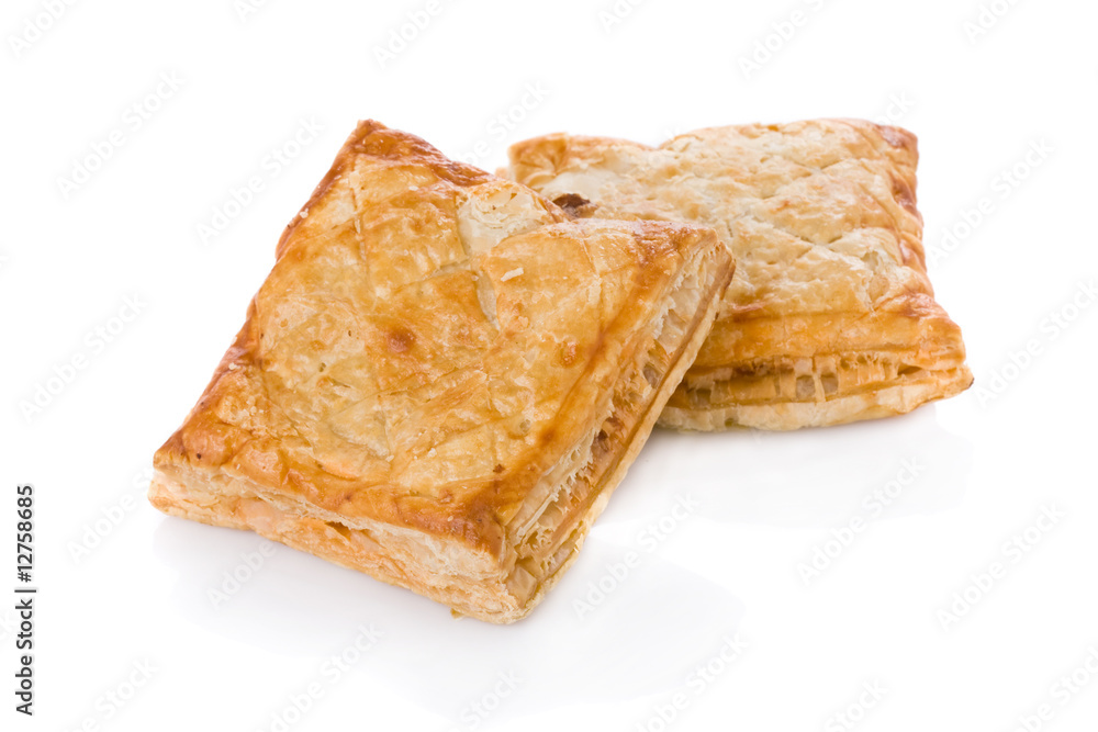 Puff pastry (sweet or salted) isolated on white background. Puff pastry (sweet or salted) isolated on white background.