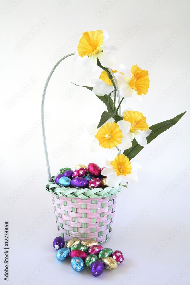 Easter egg basket decorated with flowers.