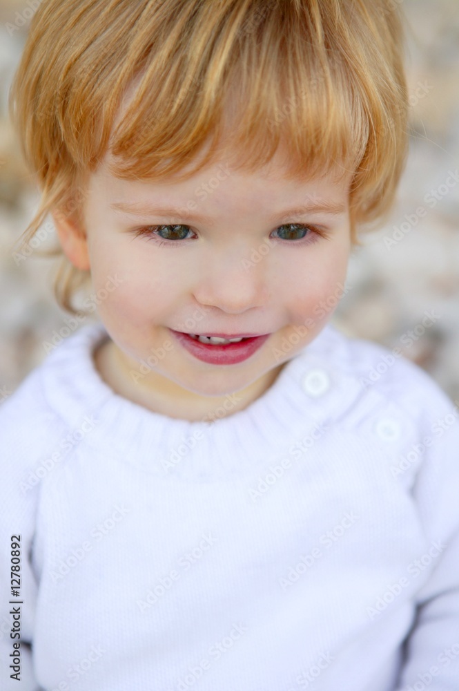boy portrait winter outdoor, stones background boy portrait winter outdoor, stones background