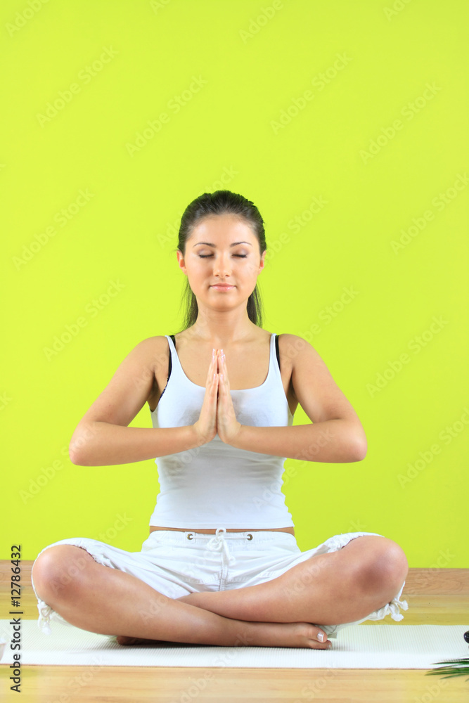Young yoga female doing yogatic exericise Young yoga female doing yogatic exericise