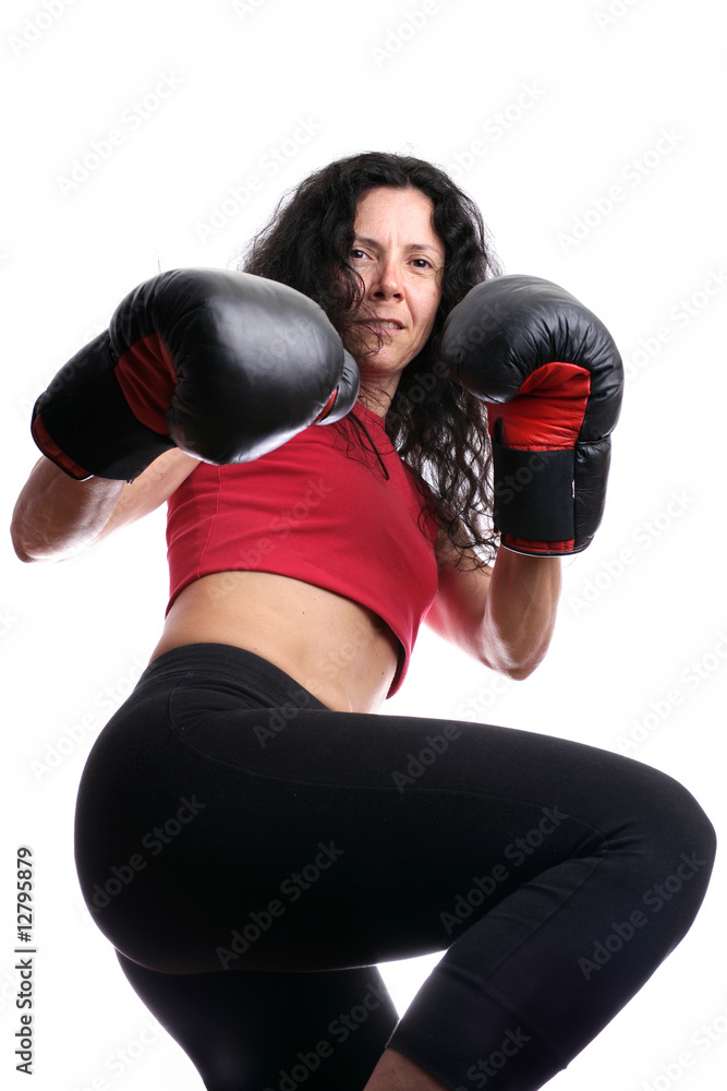 Woma with boxing gloves isolated in white Woma with boxing gloves isolated in white