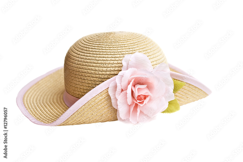 Pretty straw hat with flower on white background Pretty straw hat with flower on white background