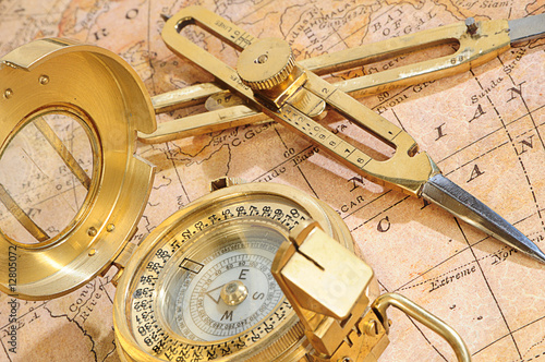 navigation device on a background an old map