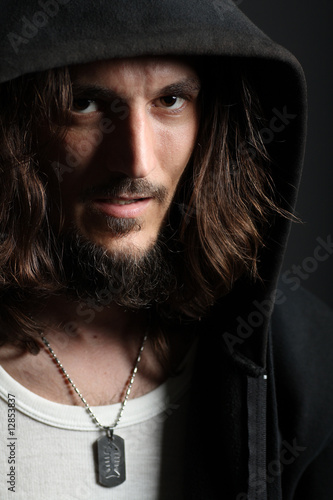 Portrait of handsome guy with dogtag