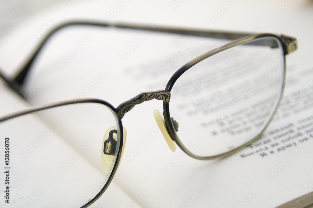 Glasses on the book. Macro shoting Glasses on the book. Macro shoting