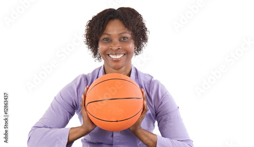 Pretty woman with balloon of basketball photo
